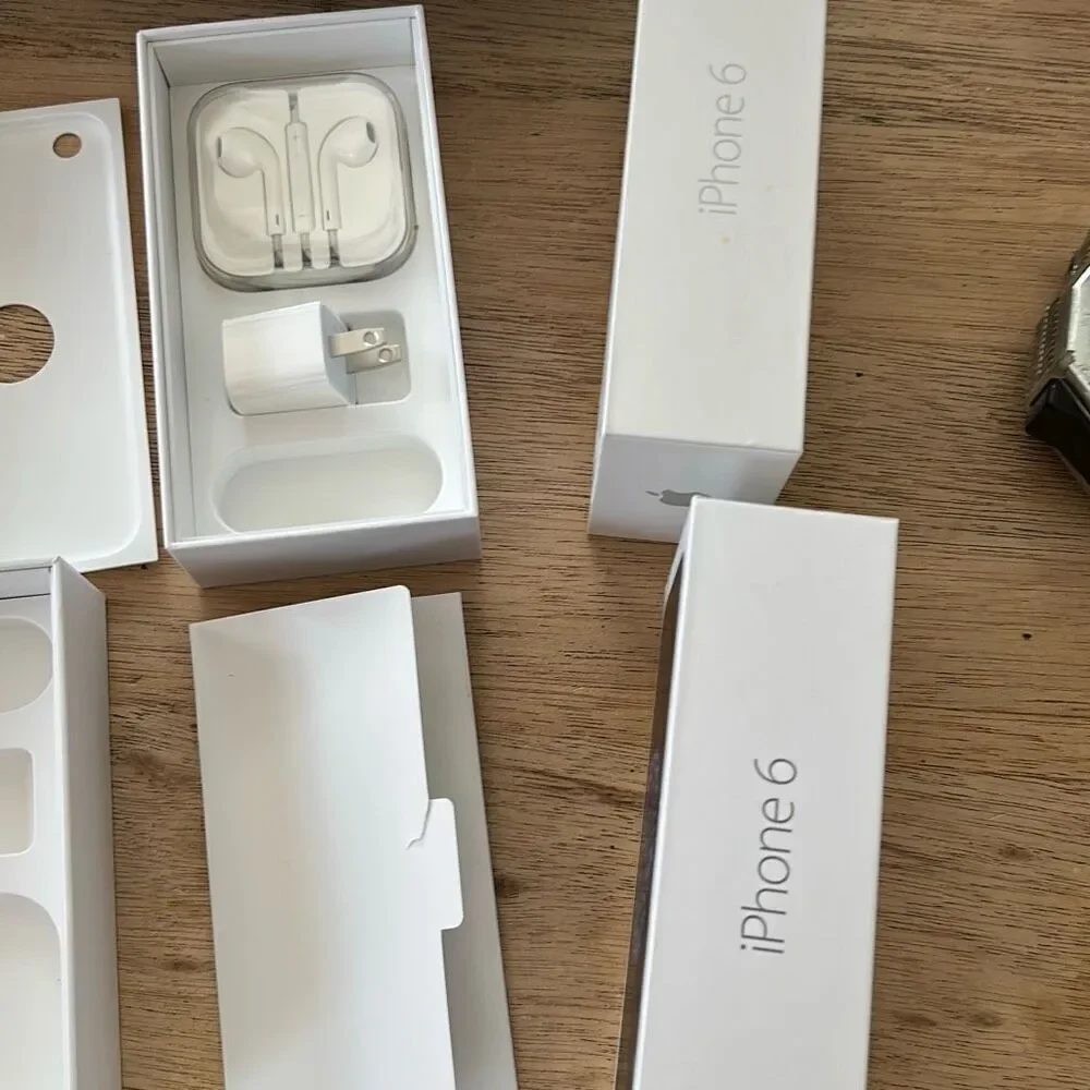 2 Apple iPhone 6 boxes with some accessories